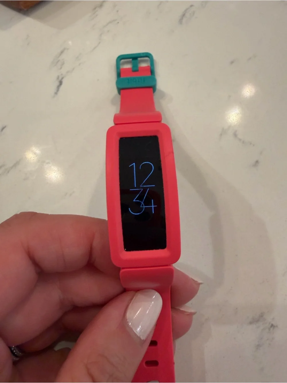 fitbit coral colored